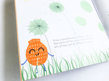 Load image into Gallery viewer, A close up of a page of What&#39;s that Splat? Activity book. Shows a orange EcoSplat character standing in the grass under a dandelion.
