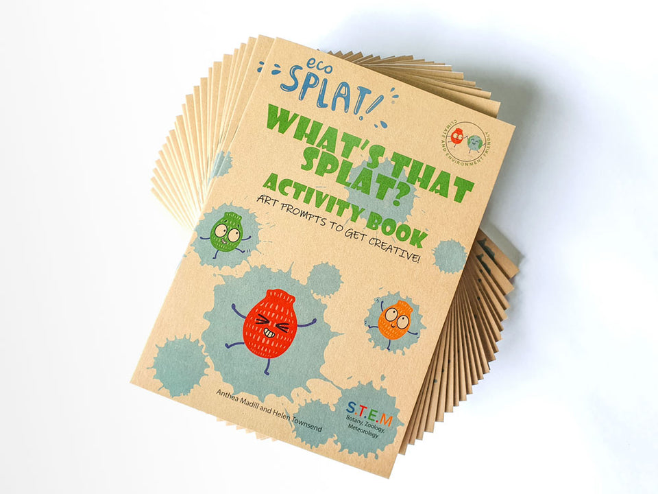 A splayed pile of What's that Splat? Activity books