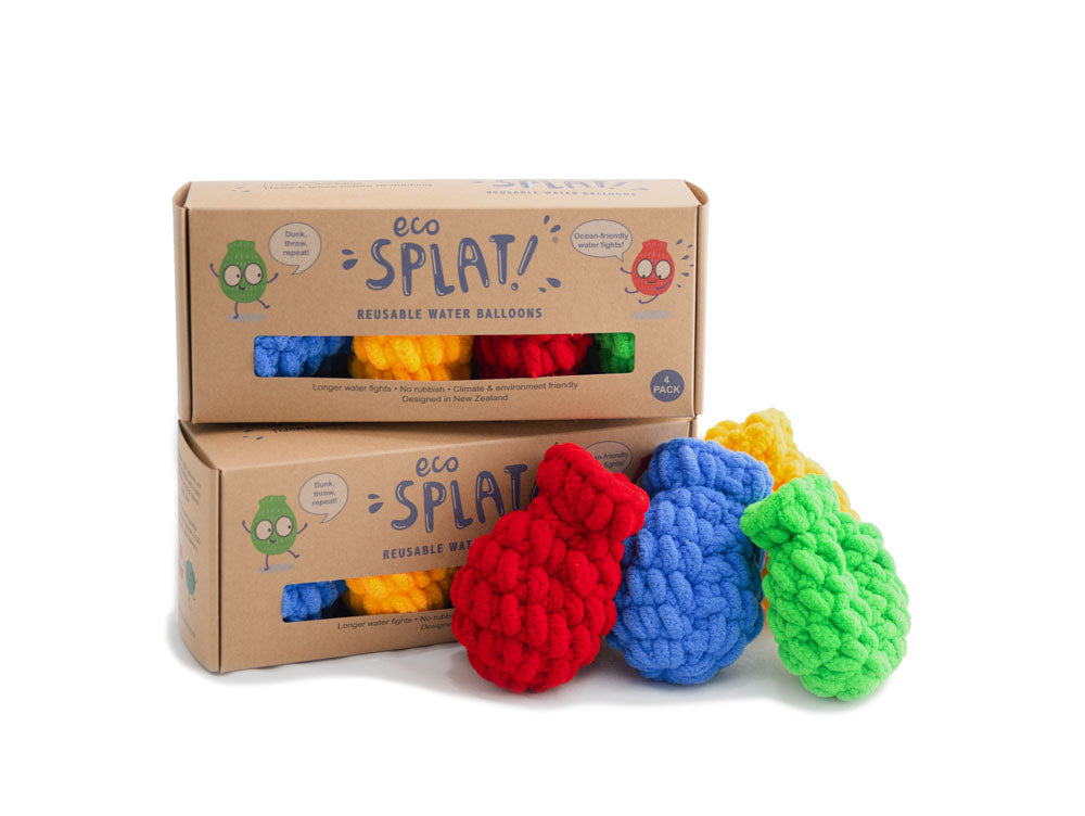 Two boxes of EcoSplat Reusable water balloons stacked on each other with four EcoSplat next to them. The EcoSplat are red, blue, yellow and green 